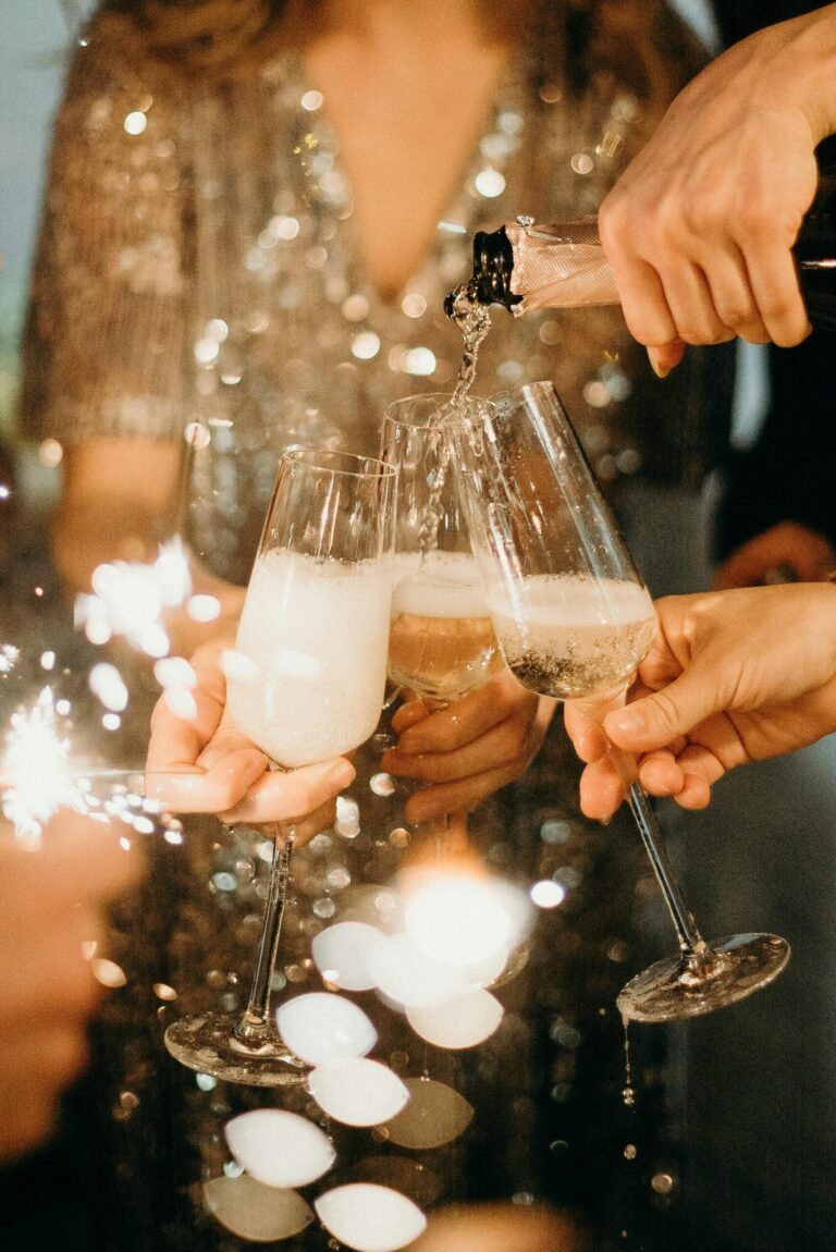 The Ultimate Guide to Champagne A Celebration of Bubbles, women toasting with champagne, champagne celebration