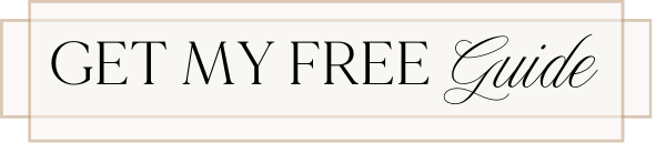 Button image with text 'Get My Free Guide' for downloading Kelly’s free Travel Essentials Guide