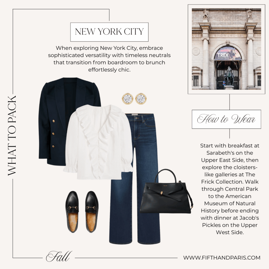 Classic fall look for New York with a navy double-breasted blazer, white ruffled blouse, dark jeans, black loafers, and a top-handle bag.